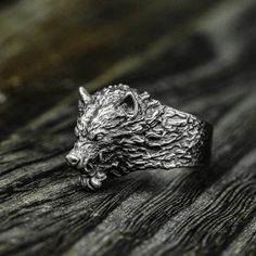 My Handmade Werewolf Totem Ring is sure to be a fun and unique fashion statement! ✦Details✦ * All of my jewelry is handmade and original designs, so I want to make sure almost all of my jewelry is nice and comfortable. My jewelry is unique in the world. It is hand cast from 925 sterling silver and oxidized to reveal details. * Size: about 22mm high * Weight: approximately 19 grams in 925 silver and approximately 16 grams in brass. * Size and weight will vary according to individual needs.    Due to being handmade and measured by hand, measurements may vary slightly. For other jewelry check out my main store page https://www.etsy.com/shop/CARO2CARA?ref=simple-shop-header-name&listing_id=1049397880 ✦Packaging✦ All of my jewelry comes gift ready, no extra packaging required! All packaging is Wolf Ring Art, Werewolf Ring, Silver Werewolf, Wolf Accessories, Fantasy Rings, Afro Jewelry, Fantasy Ring, Wolf Ring, Wolf Jewelry