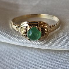 10kt Solid Yellow Gold Sz 7.25 5mm Emerald Cabochon 1.5 Grams Ships Free Classic Yellow Gold May Birthstone Ring, Classic 14k Stamped May Birthstone Ring, Antique 14k Stamped Round Emerald Ring, Gold Emerald Cabochon Ring For Formal Occasions, Classic Cabochon Emerald Ring For Formal Occasions, Classic Ring With May Birthstone, Classic Birthstone Ring With Oval Cabochon Gemstone, Timeless Round Gold Emerald Ring, Classic Domed Emerald Ring For Formal Occasions