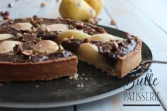 a chocolate and pear tart on a plate