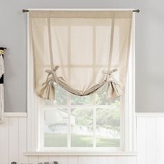 The Lawson tie-up shade from no. 918 adds personality to any window. Ideal for kitchens, bathrooms and other smaller windows, this shade gently filters light while enhancing privacy. Rod pocket design allows for simple slide-through installation on curtain rods up to 1 ½" in diameter.Number of Panels: 1Included: 1 Valance(s)Top Construction: Rod PocketTop Opening: 1 1/2 In Rod PocketUse: IndoorBase Material: 100% PolyesterLining: UnlinedLight Filtration: Light-FilteringCare: Machine WashC Curtain Ideas For Kitchen, Tie Up Valance, Bath Window, Tie Up Curtains, Tie Up Shades, Bathroom Window Curtains, Bathroom Window Treatments, Full Bathroom Remodel, Small Window Curtains