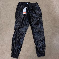 Brand New Leather Pants Zara Leather Joggers, Trendy Zara Bottoms For Streetwear, Casual Zara Pants For Streetwear, Sporty Pants For Spring Night Out, Sporty Pants For Night Out In Spring, Long Black Jumpsuit, Zara Leather Pants, Leather Joggers, Floral Print Jumpsuit