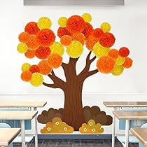 an image of a classroom setting with paper flowers on the tree