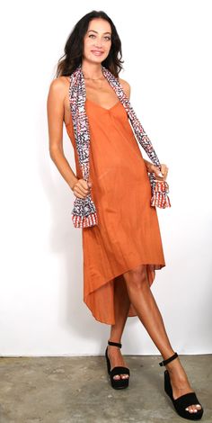 Our best seller know as our “ Poncho” is a very easy to wear shape. It has open sides, a neckline in the center and can be worn many ways and is the ESSENTIAL Travel Must have item! The poncho can be worn many ways such as shown, or as a scarf, wrap around your hip, one shoulder over a dress, and has many multi functions (see chart of many ways to wear). It’s the must have beach cover up and also looks great over jeans. We suggest you wear it on the plane to keep warm while traveling and this wa Chic Beach Cover-up Poncho, Casual Beach Shawl For Spring, Casual Poncho For Beach Cover-up In Fall, Oversized Casual Shawl For Spring, Casual Oversized Shawl For Spring, Summer Poncho For Layering, One-size Summer Poncho For Layering, One Size Summer Poncho For Layering, Casual Summer Shawl One Size