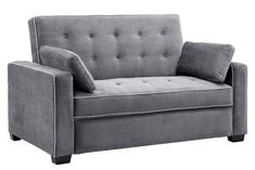 a gray couch with two pillows on it