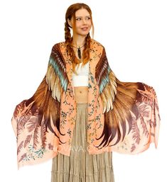 PRICES MAY VARY. Delicately Hand painted and digitally printed with beautiful peachy shaded feathered bird wings. This highly detailed representation of nature, freedom and beauty is my labor of Love. Enjoy delicate Peach, Sienna, Cream with hints of Yellow. A beautiful array of colors that work together in fresh unison. What makes this scarf truly amazing is its versatility. It can be worn with both light and dark colors and acts as a standout piece. Cotton: 100% certified organic cotton - prin Feather Shawl, Wing Scarf, Batik Painting, Bohemian Scarves, Cotton Shawl, Classic Scarf, Boho Scarfs, Printed Art, Shawl Scarf