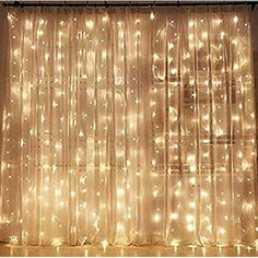 curtain with lights on it in front of a window