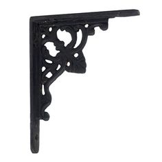 an ornate black shelf bracket on a white background