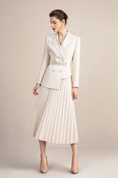 Beige V-neck With Pleated Skirt Blazer Skirt Suits Peak lapels; front button blazer V-Neck, Long sleeves; button sleeves Structured shoulders. Chest welt pockets. Pleated Skirt V-Neck, Long sleeves; buttons Structured shoulders. Chest welt pockets. Hip flap pockets Polyester 71.3% Viscose 17.7% Wool 6% Spandex 5% Imported Brand - Aision Model Number - 213144C1+S4 Luxury Beige Shirt Dress For Formal Occasions, Luxury Tailored Chic Skirt, Luxury Pleated Cream Skirt, Luxury Elegant Pleated Outerwear, Luxury Beige Flared Skirt Dress, Luxury Tailored Beige Dress, Luxury Spring Business Casual Blazer Dress, Luxury Beige Skirt With Accordion Pleats, Luxury Structured Elegant Skirt