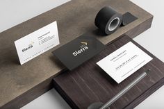 a desk with some business cards on it