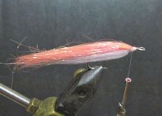 a close up of a fishing lure on a hook