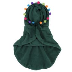 a green towel with multi colored pom poms on the front and back of it