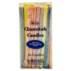 four candles are in a package on a white background with the words chanukah candles