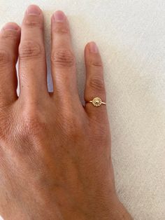 Hey honey, it's sunny!  Adorn yourself or a loved one with this sweet, comfortable and delicate 14k solid gold ring. DETAILS: -6mm sun disk -1mm flat band *Hallmarked 14k *Handmade to order *Model wears US size 2.5 Solid gold sales are final. Thank you Dainty Sun Design Jewelry For Everyday, Gold Coin Ring, Gold Ring Band, Gold Pinky Ring, Sun Ring, Pinky Rings, Hey Honey, Bellingham Wa, Ring Matching