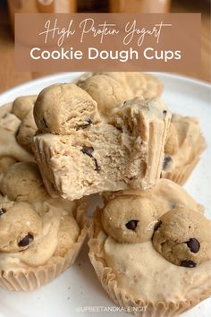 some cookies are stacked on top of each other with the words high protein yogurt cookie dough cups