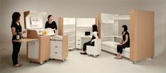 three women are sitting in bunk beds and talking to each other