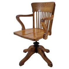 an old fashioned wooden chair with wheels on it's legs and seat is shown