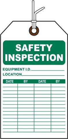 a safety inspection sign hanging from a hook