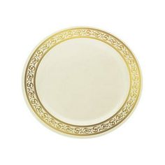 a white and gold plate with an ornate design on the rim, against a white background