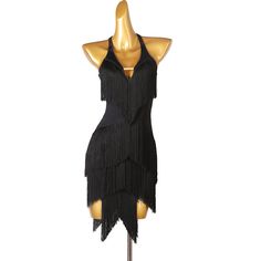 a mannequin wearing a black dress with fringes