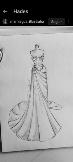 a drawing of a dress on a piece of paper