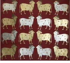 a group of cows standing next to each other on top of a red wallpaper