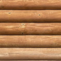 a close up view of the wood grains on a log cabin wall made from logs