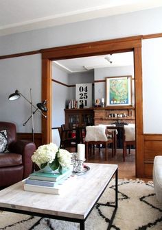 the living room is clean and ready to be used as a den or dining area