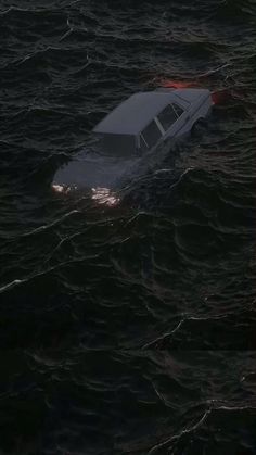 a car that is floating in the water