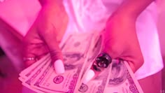 a person holding money in their hands with the words laceboy, chapter one