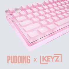 a pink computer keyboard with the words puddinging x keyz on it's side