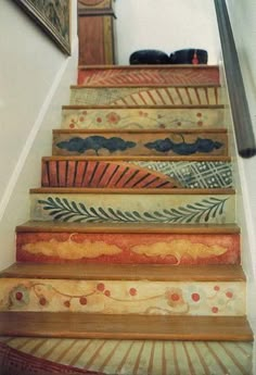 the stairs are painted with colorful designs