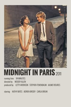 a movie poster for midnight in paris 2011 with two people standing next to each other