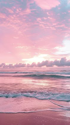 the sun is setting over the water at the beach