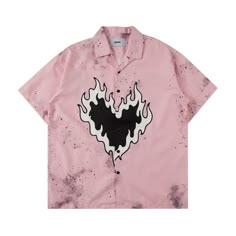 a pink shirt with black and white flames in the shape of a heart on it