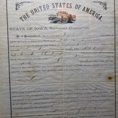 an old document with writing on it that says the united states of america state of iowa, buchanan county