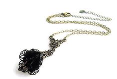 Absolutely gorgeous Victorian-style inspired hand-painted black orchid choker necklace. Romantic statement accessory for any occasion to compliment any outfit. This botanical flower pendant necklace is created with hand-dyed ruffled Lucite orchid flowers embellished with fancy antique brass filigree wraps and adorned with layers of antique brass leaf caps topped with sparkling small black glass crystal beads. Three black crystal beads dangle inside each flower imitating the flower stem. The pend Victorian Necklace Antique, Gothic Choker Necklace, Gothic Choker, Orchid Earrings, Victorian Necklace, Gothic Chokers, Brass Filigree, Flower Stem, Orchid Flowers