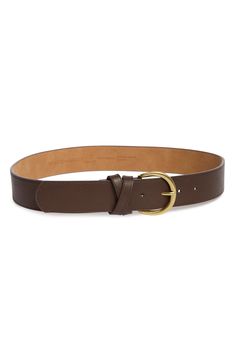 A crossed keeper secures this wide faux leather belt centered with a polished rounded buckle. Polyurethane/metal Imported Brown Belt With Buckle For Everyday Use, Fitted Brown Leather Belt, Chic Brown Belt With Buckle Closure, Brown Belt Gold Buckle, Luxury Brown Belts With Gold-tone Hardware, Faux Leather Belts, Leather Belts, Suspenders, Leather Belt