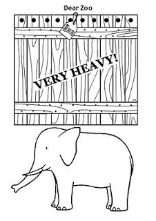 an elephant standing next to a fence with the words very heavy on it