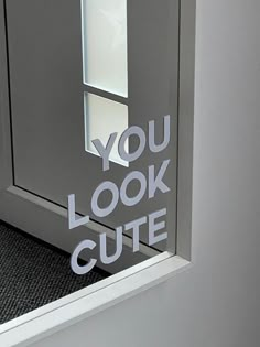 a door with the words you look cute on it