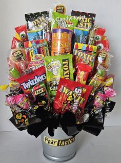 a bucket filled with lots of candy and candies