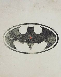 the batman logo is shown on an old paper background with red dots in the center