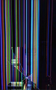 an image of colorful lines in the dark