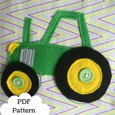 a close up of a green and yellow toy tractor on a bed with text overlay that reads, pdf pattern