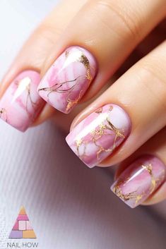 Ethereal pink marble nails with gold foil accents - perfect for summer! Get this chic pink summer nail design and more at nailhow.com Pink And Gold Nails Short, Marble Pink Nails, Pink And Gold Nail Designs, Pink Marble Nails, Light Pink Nail Designs, Marble Nails Tutorial, Pink Nail Art Designs, Neon Pink Nails, Pink Summer Nails