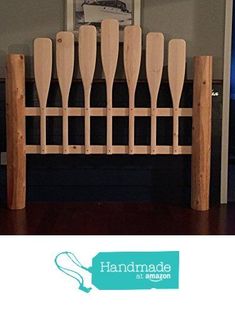 a wooden headboard with paddles on it