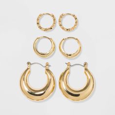 Three-piece gold-tone earring set with hoop designs in varying sizes and finishes. Easy to slip into pierced ears, with nickel-free metal being compatible for most skin types. Gender: female. Age Group: adult. Hoop Earring Set, Eighth Grade, Hoop Earring Sets, Stud Earrings Set, Jewelry Inspo, Sterling Silver Studs, Sterling Silver Earrings Studs, Ear Jewelry, Wild Fable