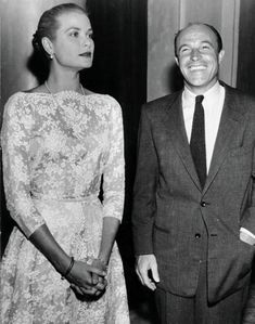 a man and woman standing next to each other