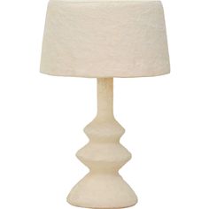 a white table lamp with a cream shade on it's base and a light bulb in the middle