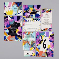 an assortment of colorful wedding stationery and save the date cards