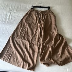 Tan Wide Leg Linen-Esq Tie Waist Pocket Flowy Pants. No Flaws! Super Comfortable. I’m 5’3” Perfect Length For Me!! Brand New!! Plz Don’t Low Ball Or Offer Low. I Just Bought These So I’d Like To Get As Close As Possible To What I Bought Them For. Thanks Flowy Linen Pants, Linen Pant, Cell Phone Holster, Phone Holster, Flowy Pants, Walker Boots, M Pants, Fit N Flare Dress, Linen Pants